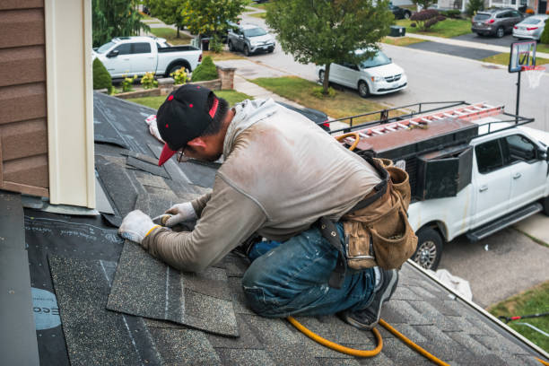 Professional Flat Roof Repair technician working in Bat Cave, NC